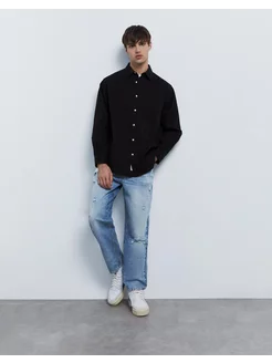 Джинсы Tapered fit